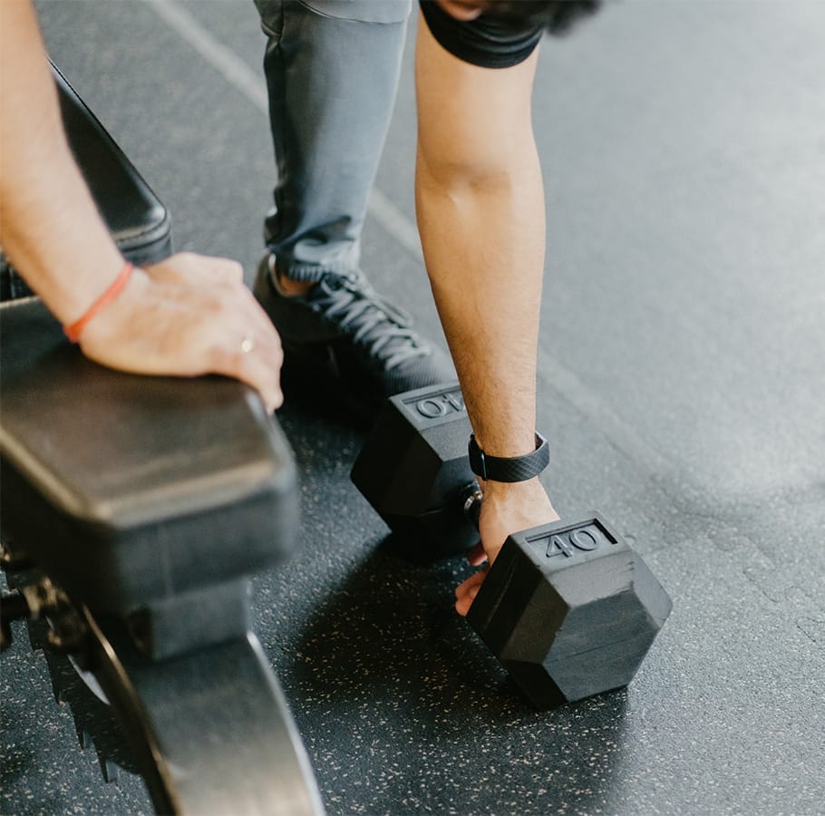 Personal Training 1 man working out with dumbells